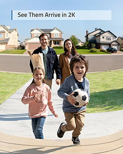 Family with kids walking on a sunny neighborhood street with the Eufy Security Video Doorbell S220 in the background